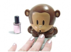 Самая необычная сушка для ногтей, которую я видела. Эта маленькая обезьянка-сушка дует вам на ногти. Довольно практично даже оп размерам. Лампа намного объемнее.